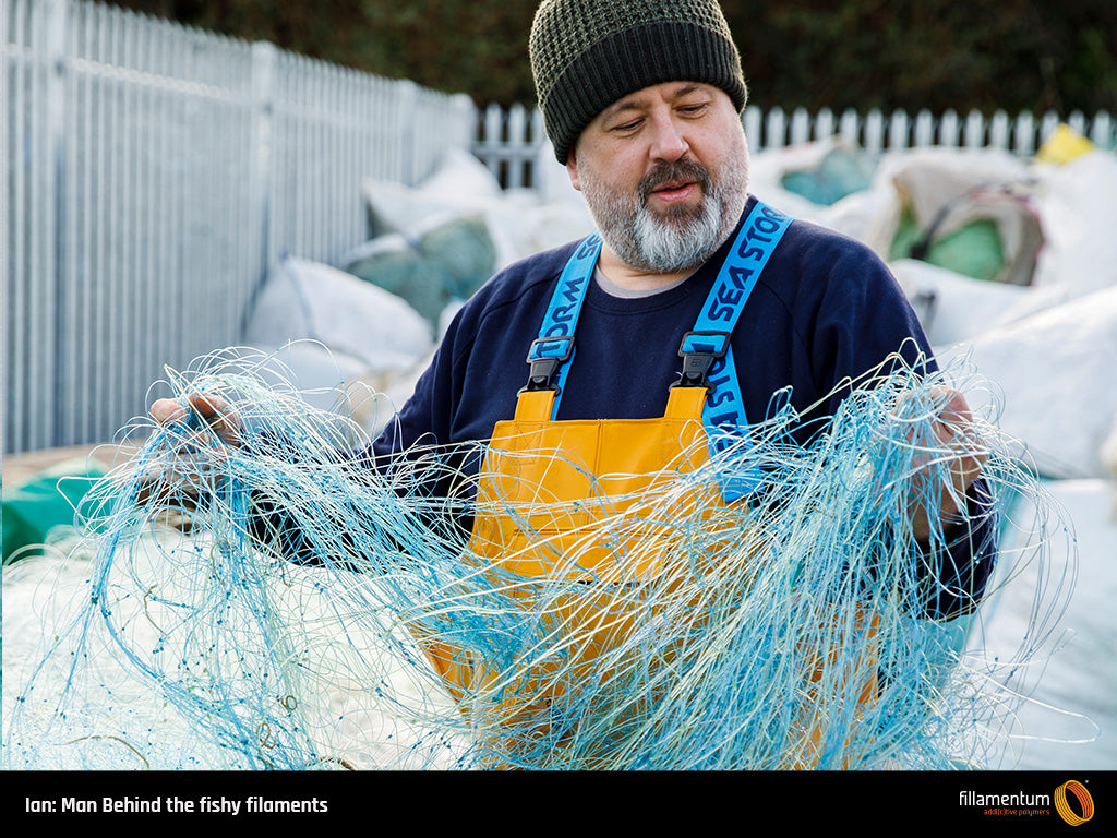 Ian Falconer of Fishy Filaments holding reclaimed fishing nets from Cornwall